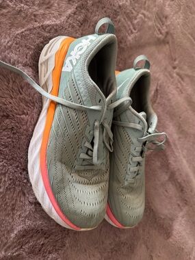 Hoka Women's Mint Green Running Shoes with Orange Accent